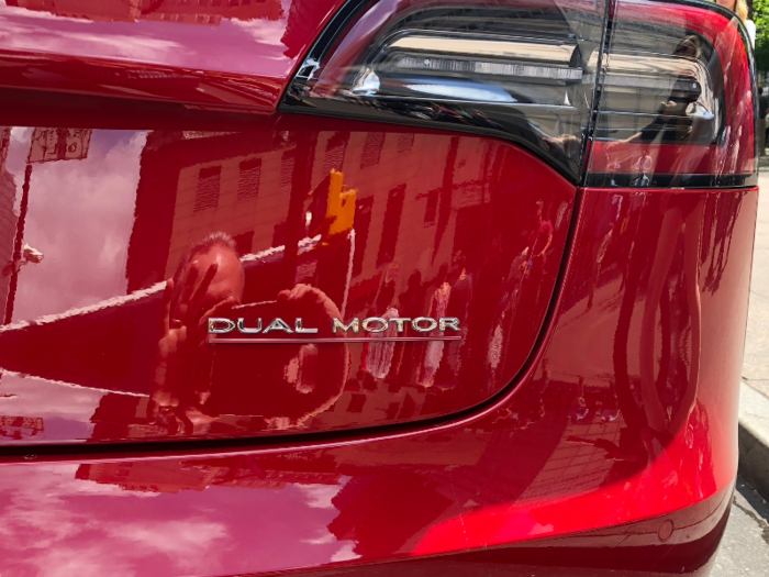 You can can barely tell that this car is the beastliest Model 3. The only overt tip beyond the wheels, tires, and spoiler is the "Dual Motor" designation on the right rear corner corner of the hatch.