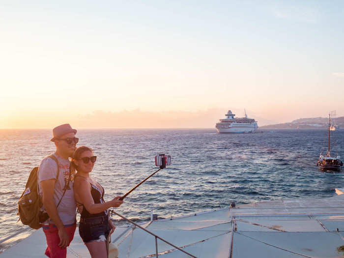 While a few people were sitting and watching the sunset, most were trying to get the perfect shot.