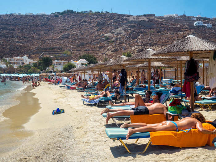 Psarou Beach is dominated by Nammos Beach Club, which offers a restaurant, bar, beach cabanas, and a chummy party scene.