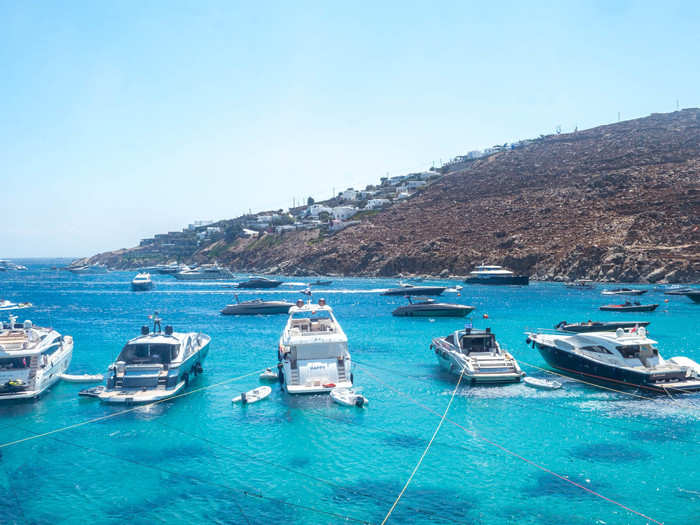 The first indication that Mykonos is a place for the rich hits you as you walk along the coast.