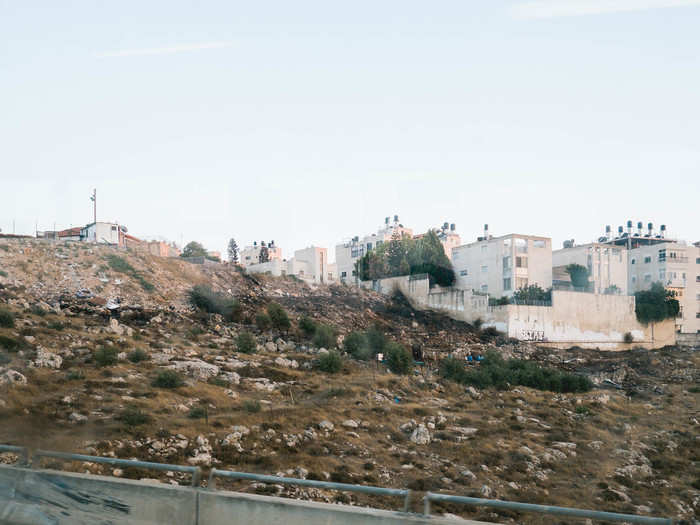 What is perhaps most striking about going through the crossing is how identical the landscape and the architecture is on either side of the wall. It may seem obvious, but it drives home how the wall has separated communities in the name of reinforcing security. By the time I got to East Jerusalem, it was a bit after 8 p.m. A two-hour journey in total.