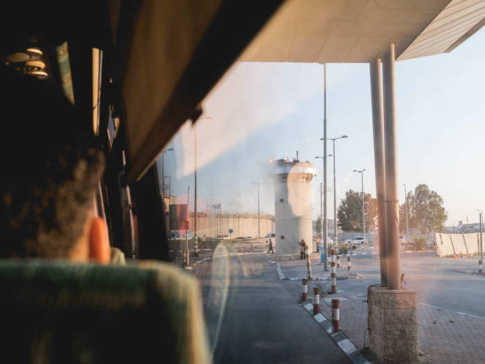 As we moved through the gridlock, I fell asleep for a good 30 minutes while it felt like we were at a standstill. While many take the bus through the checkpoint, others must pass through on foot.