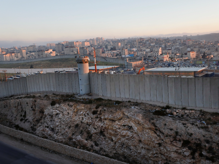 Along the way, you get a view of the 285-mile separation wall built in the early 2000s to separate the West Bank from Jerusalem and Israel. What you call the barrier — it is often referred to alternately as “The Apartheid Wall,” “The Security Fence,” and “The Border Wall” — says a lot about how you view the Israel-Palestine conflict.