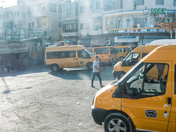 The bus station is also filled with service taxis (or servees), which are shared minibuses that take Palestinians to a number of destinations around the West Bank.