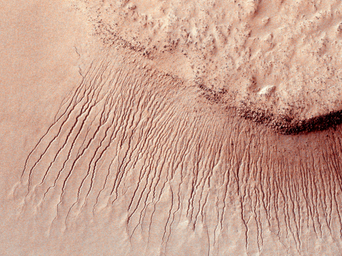 This long row of channels, ranging from 1-10 meters wide, is found in the Hellas impact basin in Mars