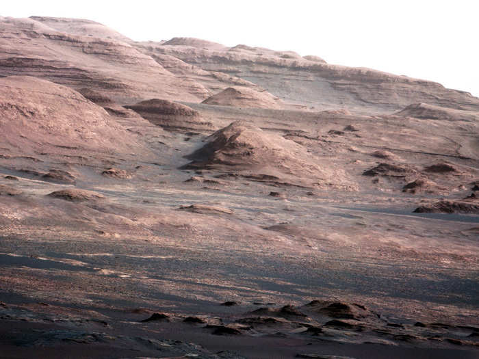 Just after arriving in 2012, Curiosity took this shot of the base of Mount Sharp, its eventual destination. Many of the mountains and canyons of Mars have names, just like geological features on Earth.