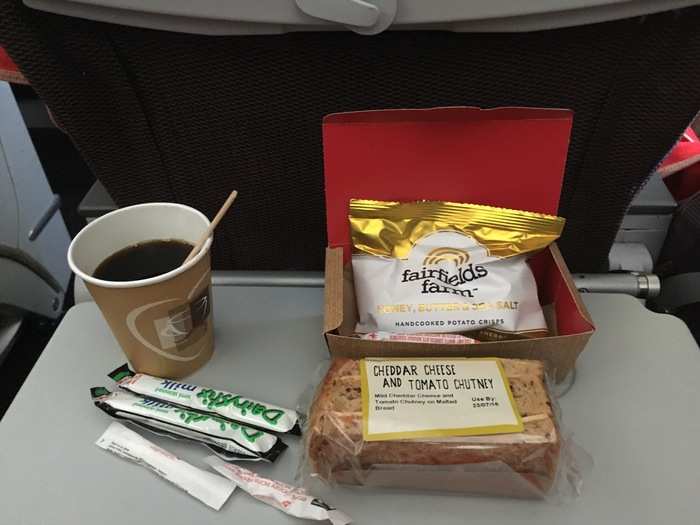 Shortly before landing, we were served afternoon tea completed with a cheddar and tomato chutney sandwich which wasn