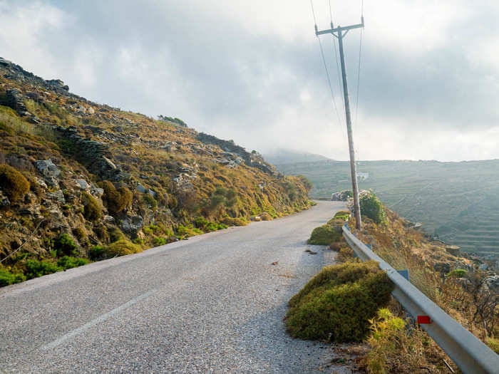 After Panormos, it was time to head back towards Chora, preferably before dark, as the sunset is most visible on the southern side of the island. But I was taking it easy on these roads, lest I fall off a cliff into the stunning greenery.