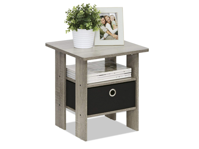 A bedside table with layers of storage