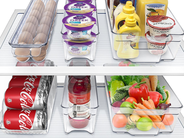 A set of fridge bins that are made to store basic foods