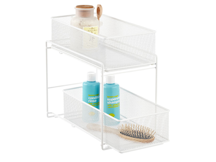 A mesh basket organizer that makes under-sink storage accessible