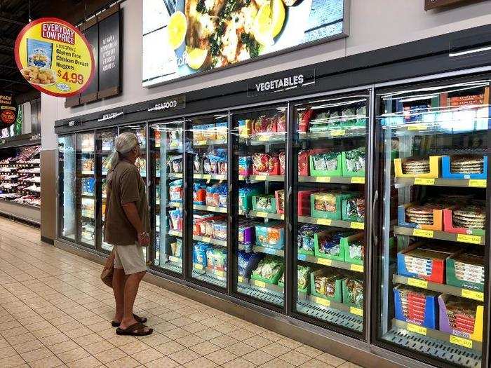 The new design, on the other hand, added more refrigerated space across the store, with new sleek signage featuring white text against a black backdrop.