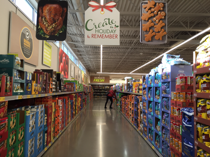 By comparison, the aisles in an older store I visited in 2015 were darker and shorter, and they featured gray flooring.