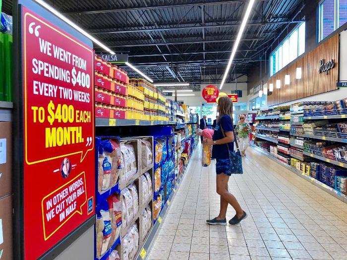 Beige tiled floors helped brighten the interior of the store, along with additional lighting fixtures on the walls.