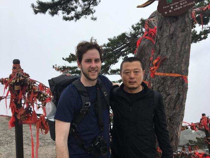 At East Peak, I met two tech developers from Beijing who had come to Mount Hua for the day. After one asked to take a photo with me, they explained that they had started hiking in the morning and reached East Peak at the same time I did. It was 5:30 p.m. and I was freaking out. If I missed the last cable car, I would have to stay at the hostel at the top of the mountain for the night.