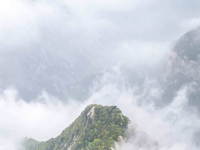 The view as you are walking is vertigo-inducing. While the "plank walk" is often described as "the most dangerous hike," all of Mount Hua is dangerous. The trail is very thin and, on either side, there are sheer drops. People with a fear of heights will not do well.