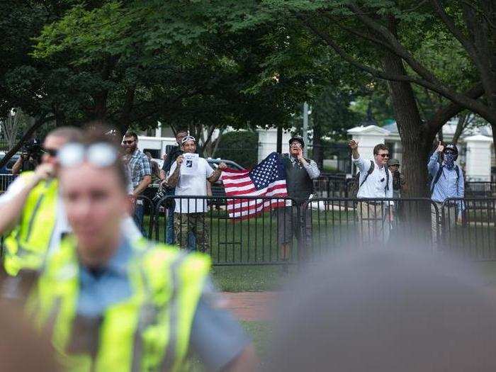 The police barrier effectively kept the two groups separated from each other.