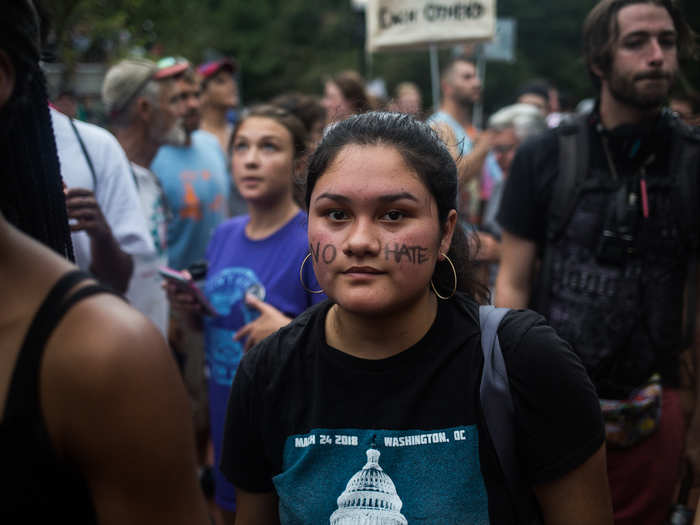 Thousands of counter-protesters began to fill Lafayette Square by noon.