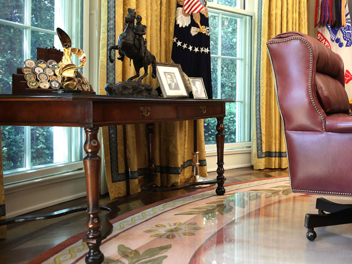 Today, he keeps framed photos of his parents, Fred and Mary Trump.