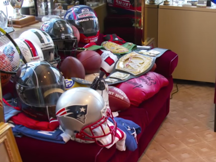 As well as a couch-load of sports collectibles, from Tom Brady