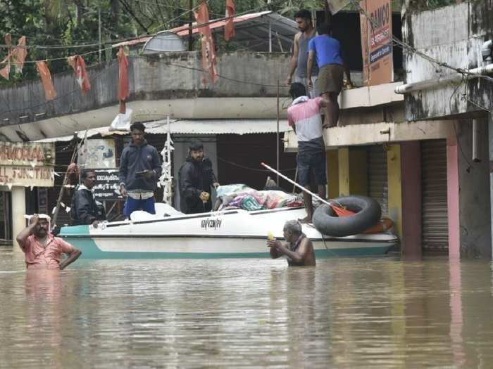 People stranded on rooftops were airlifted or steered to shelter by boat.