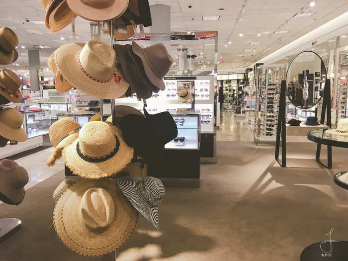 ... and plenty of accessories like hats, scarves, and sunglasses. The floor was in pristine condition, with spotless floors and perfectly arranged displays.