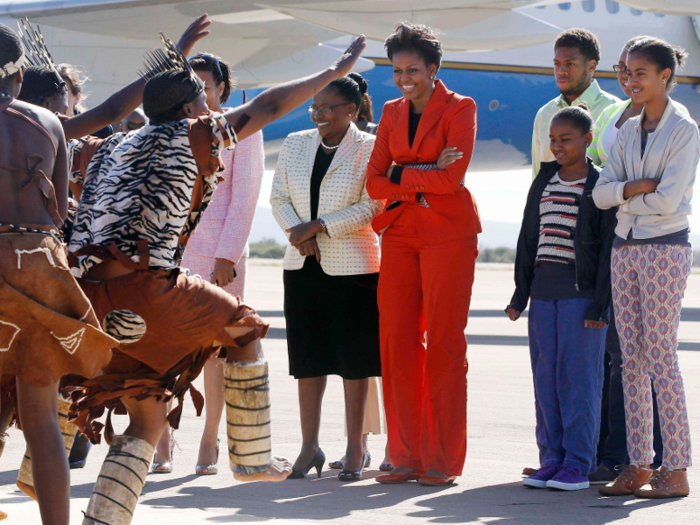 Traveling with her mother, Marian Shields Robinson, and her daughters, Sasha and Malia, Obama promoted youth leadership, education, health, and wellness.