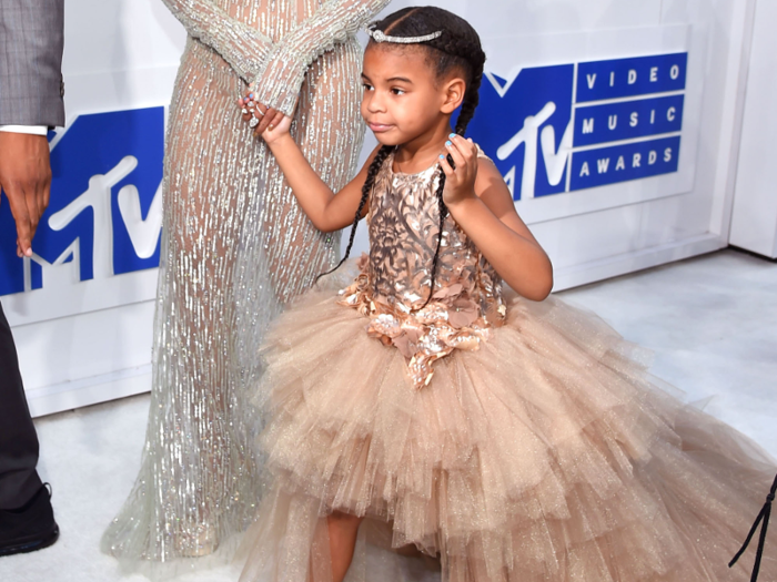 She also dresses Blue Ivy in designer duds, like a $2,100 Gucci dress and a butterfly and Swarovski crystal metallic Mischka Aoki dress that ranges from $8,405 to $10,637.