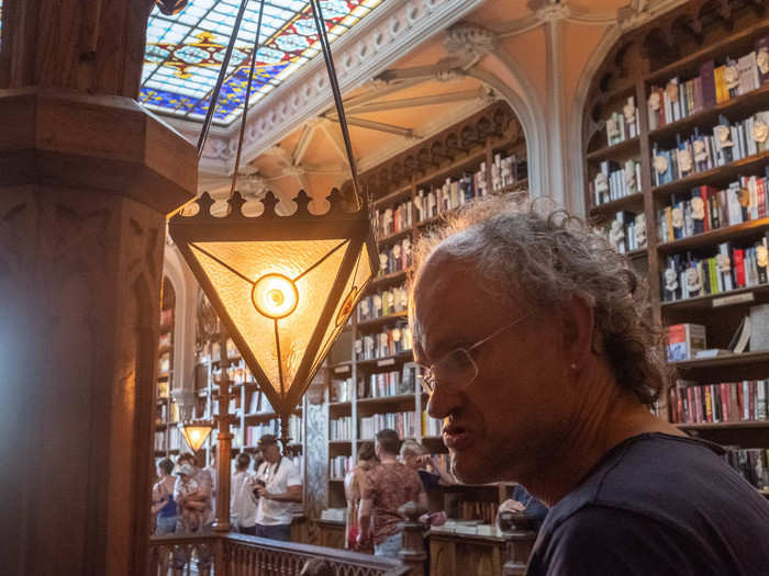  These pyramid-shaped lamps hanging from banisters added to the magical air in the bookstore. 