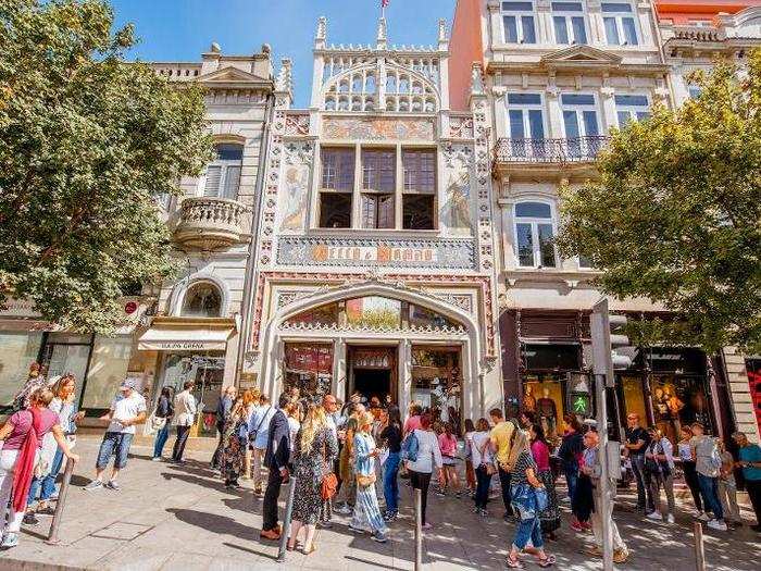 Opened in 1906 — though there were a few predecessors dating to 1869 — the bookstore was designed by engineer Francisco Xavier Esteves. The bookstore has long a popular haunt for writers and readers in Porto, but up until recently it suffered serious financial problems.