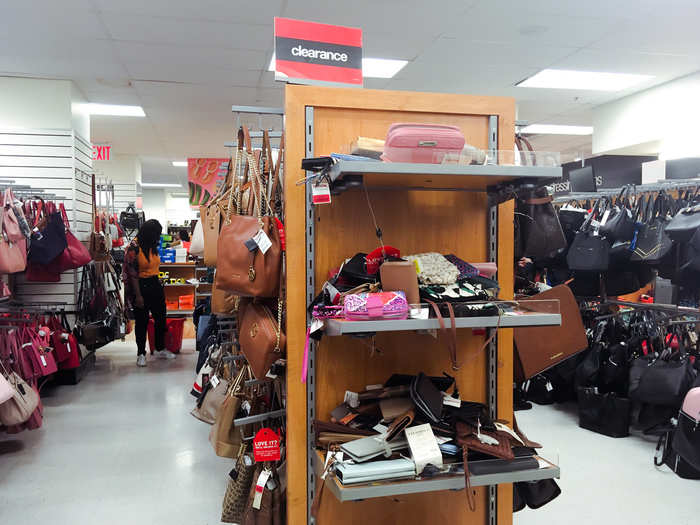 There was a huge variety of handbags and wallets, and everything was either on clearance or had a low starting price. But there were bags tangled up and tossed all over the floor.