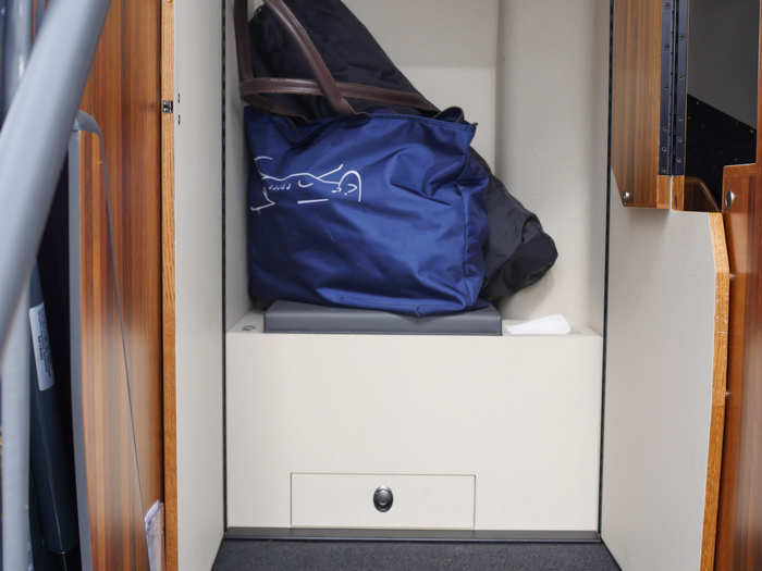 A compartment between the cockpit and the passenger seats is where the bathroom sits, with doors that close on either side providing privacy from others on the plane. No one used it during my short trip.