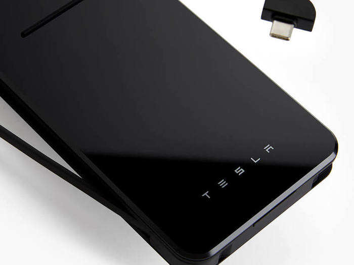 Tesla designed a $65 wireless charger for smartphones - but they