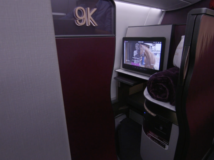 At the front of the cabin are 46 private business class suites, called the QSuite.