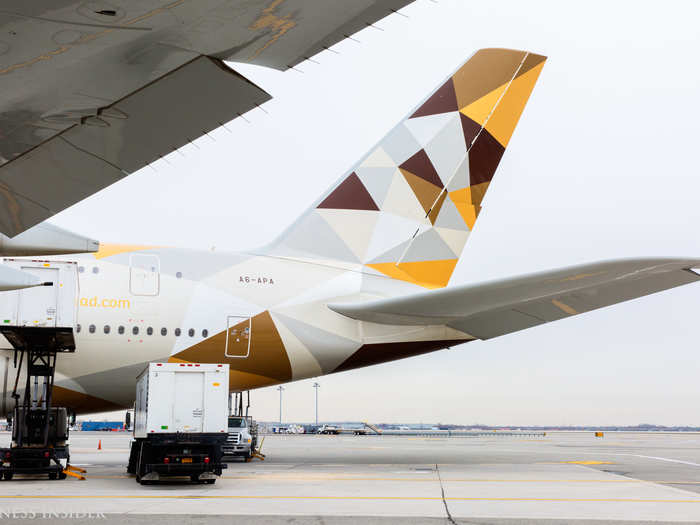 There were more catering trucks at the back of the aircraft.