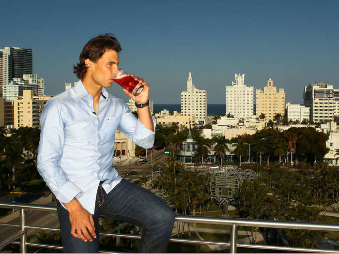 Here he is drinking more of the good stuff, this time in Miami Beach in Florida. Cheers!