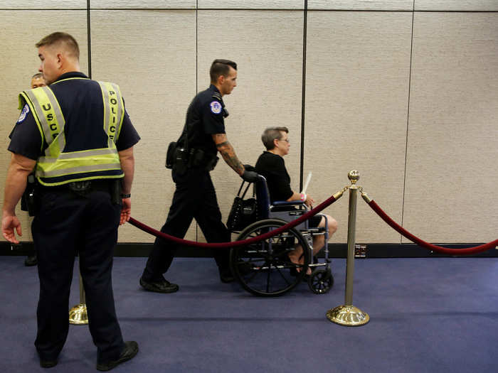 At least 22 protesters were arrested on Tuesday, including one person in a wheelchair.