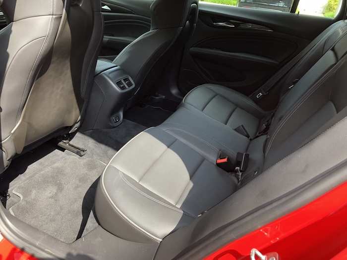 The rear seats are less snazzy, but they