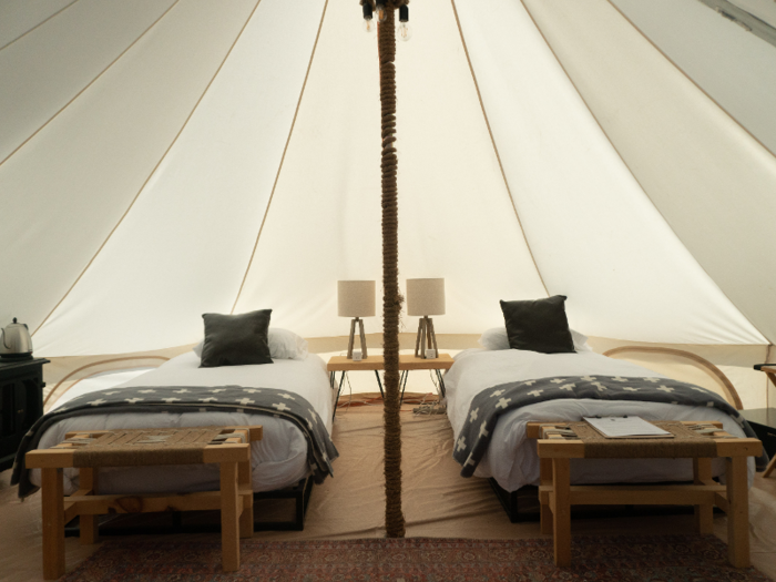 In the Journey Tent, guests have the choice of a queen bed or two single beds, which come with 1,000-thread count linens and down comforters.