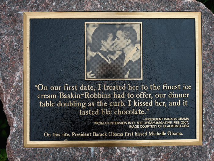 Now, the spot where the Obamas first kissed is marked with a plaque.