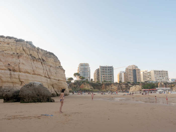 Personally, my favorite part was the tall, ochre cliffs that surrounded the beach. This big one on the left spread shade for 50 feet or more.