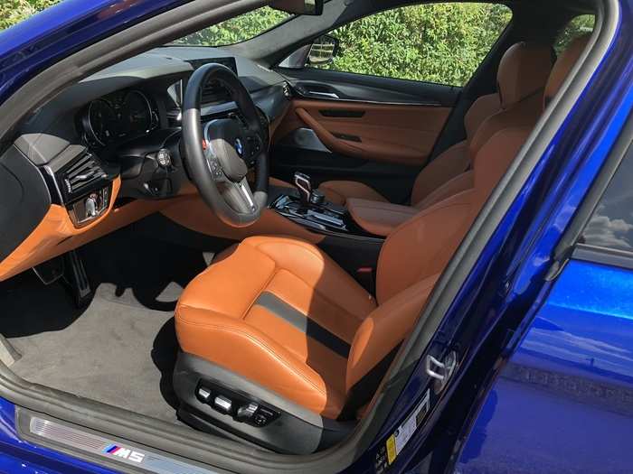 An interior of Aragon Brown Merino leather awaits. The seats are abundantly adjustable, and the bolstering can be refined to hug you tight for spirited driving. They are both heated and cooled.