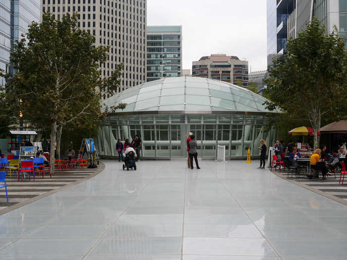 Toward the east side of the park is a plaza of sorts. A giant dome serves as the skylight that hangs over the grand foyer below.