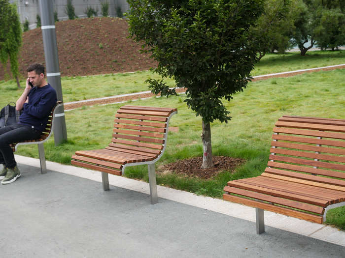 Tiny, one-person benches line the park