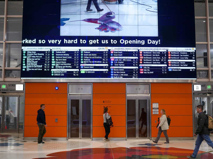 Commuters can find their bus connections and arrival times listed on a giant display board.