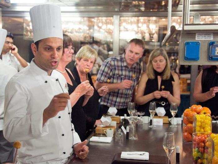 In fact, there he is right below with his guests as they enjoy some meat on a skewer.