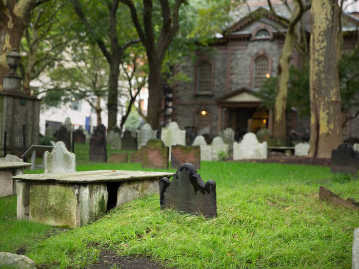 The oldest grave in the cemetery, which wraps around the two sides of the chapel, dates back to 1704.