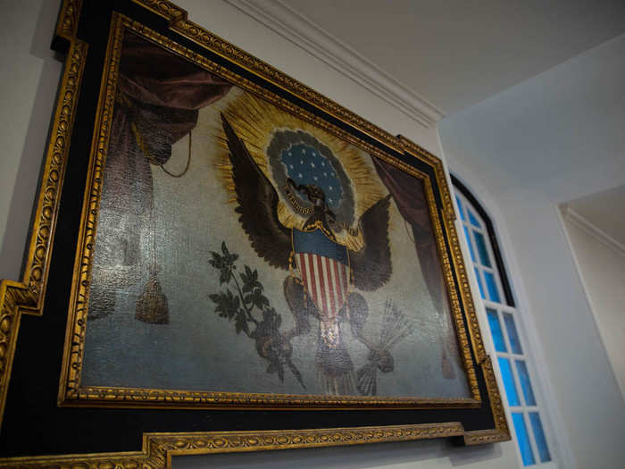 One of the earliest paintings of the US Great Seal hangs along a side wall. There