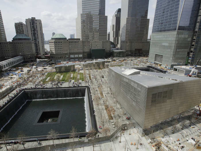 The memorial waterfalls officially opened in September 2011, and the museum, seen on the right, opened in May 2014.