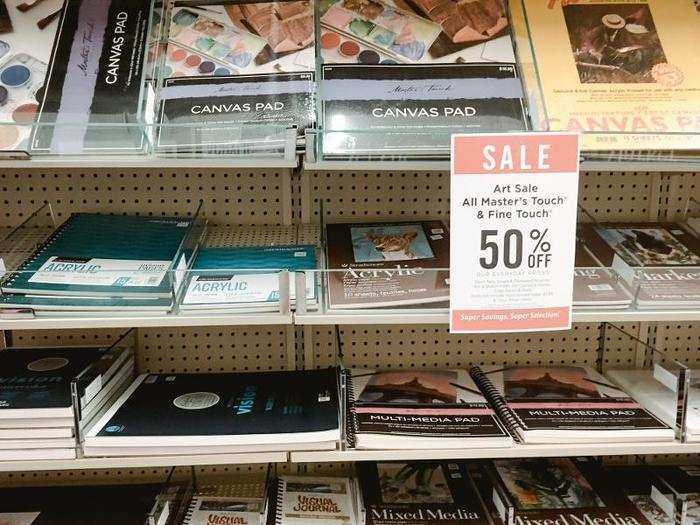 Sale signs sat atop almost every display, often advertising as much as 50% off.